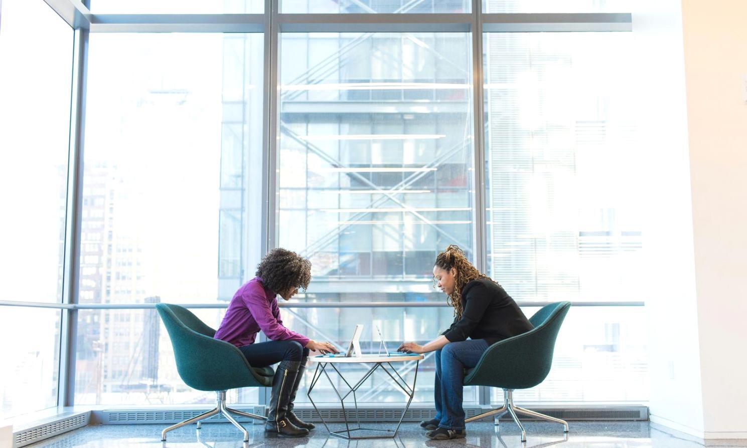 Professional business meeting discussing financial strategies and planning